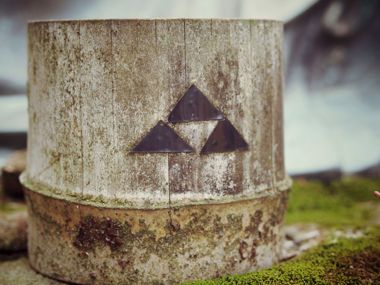 focus on foreground, close-up, old, weathered, day, selective focus, metal, abandoned, outdoors, textured, stone material, no people, built structure, damaged, stone wall, wall - building feature, rusty, stone, run-down, stone - object