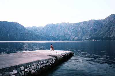 Scenic view of river and mountains