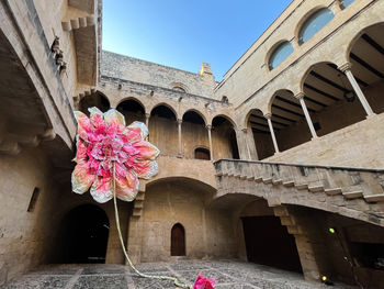 Masive flower in the spanish traditional courtyard during art festival