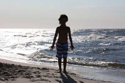 People standing on beach
