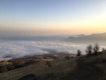 Scenic view of landscape against sky during sunset