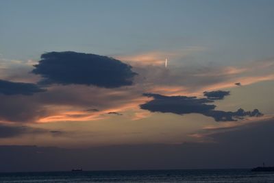 Scenic view of sea against sky at sunset