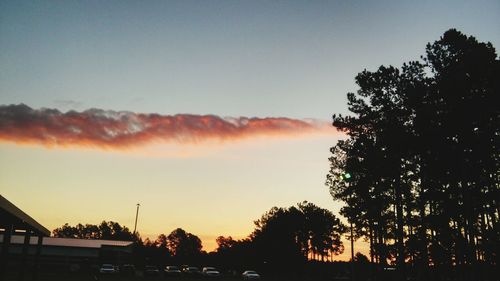 Scenic view of landscape against sky at sunset