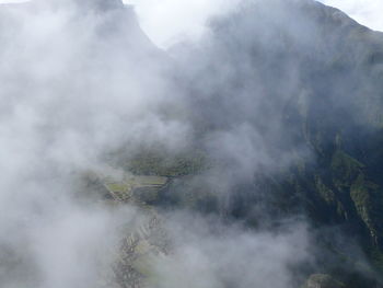 High angle view of fog over land