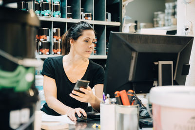 Young woman using smart phone