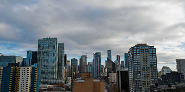 Modern buildings against sky in city