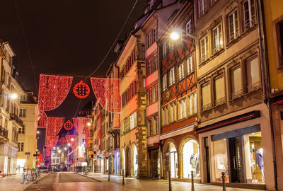 Low angle view of illuminated building at night