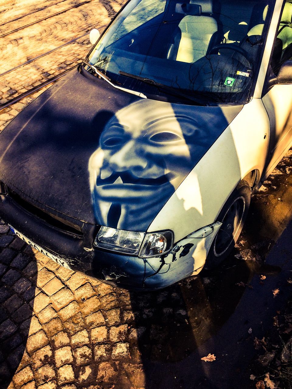 REFLECTION OF MAN IN CAR