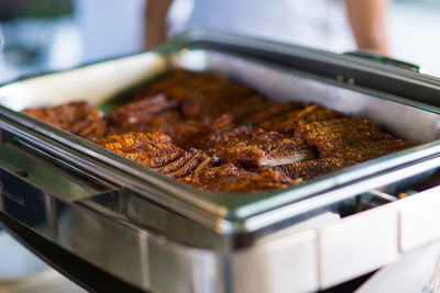 Close-up of meat on barbecue grill