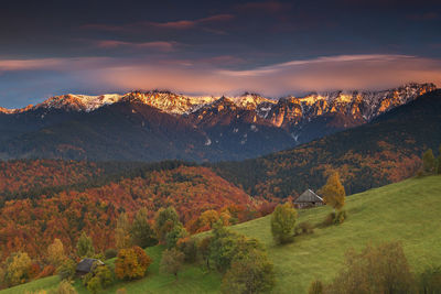 Scenic view of snowcapped mountains against sky