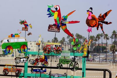 Multi colored toys against sky