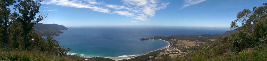 Scenic view of sea against blue sky