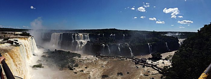 Panoramic view of waterfall against sky at night