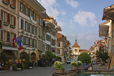 Panoramic view of buildings in city against sky