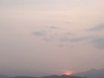 Low angle view of dramatic sky during sunset