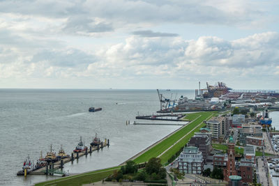 High angle view of boats in sea against sky