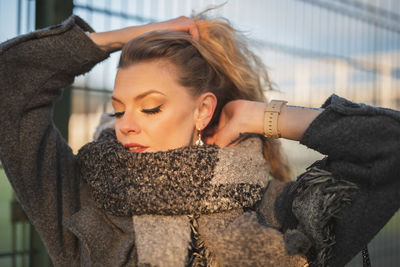 Portrait of young woman looking away