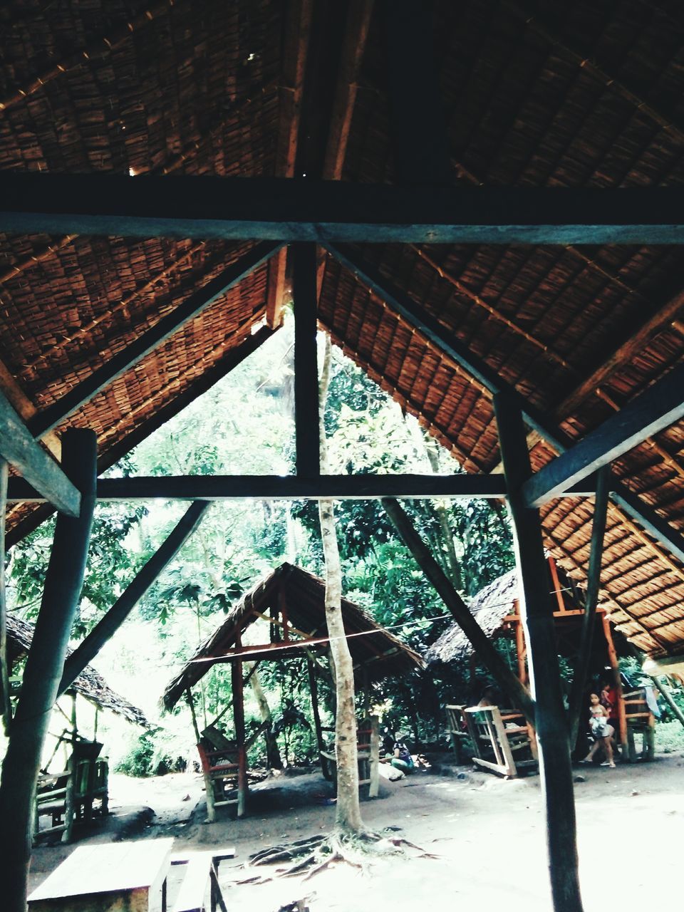 LOW ANGLE VIEW OF BUILT STRUCTURE AND TREE