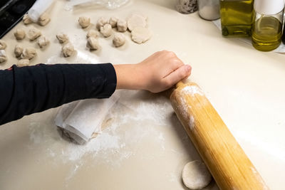 Cropped hand of person washing hands