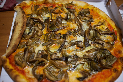 High angle view of pizza in plate on table