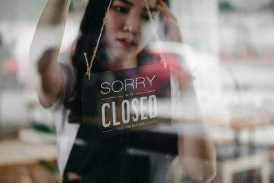 Portrait of a young woman with text