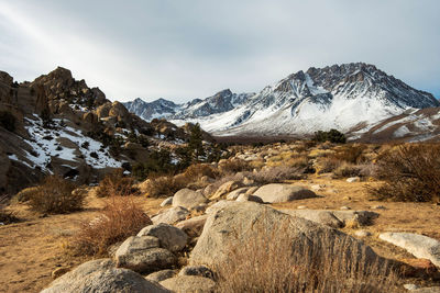 Scenic view of snowcapped mountains against sky