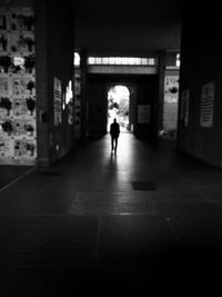 Man walking in corridor