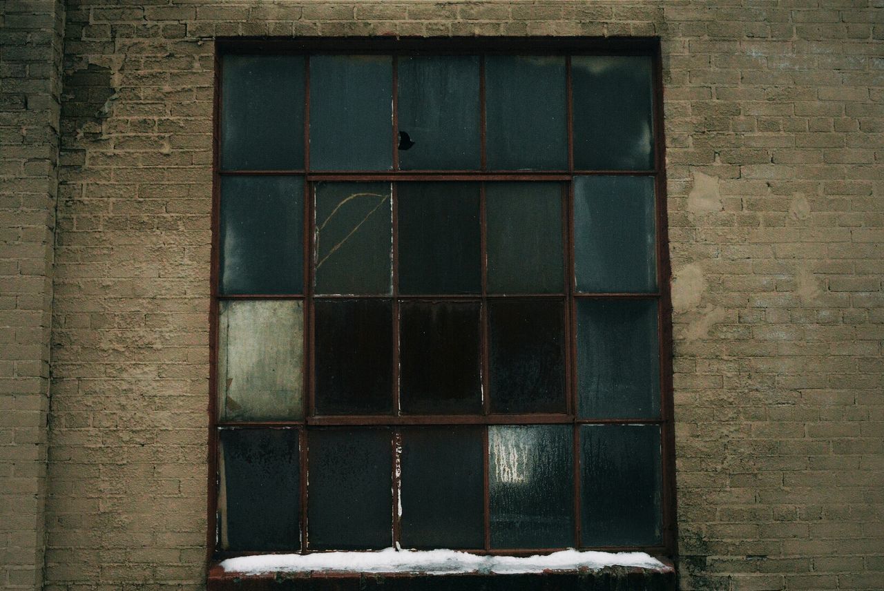 building exterior, architecture, built structure, window, wall - building feature, brick wall, closed, house, wall, outdoors, day, door, no people, white color, snow, residential structure, building, old, weathered, cold temperature