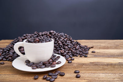 Close-up of coffee beans on table