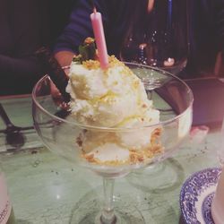 Close-up of ice cream served on table