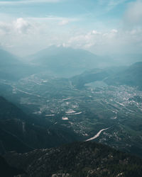 Aerial view of landscape and mountains against sky