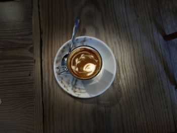 High angle view of coffee cup on table