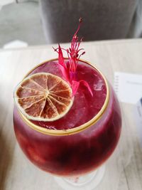 High angle view of fruits in glass on table