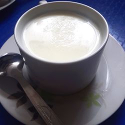 High angle view of coffee cup on table