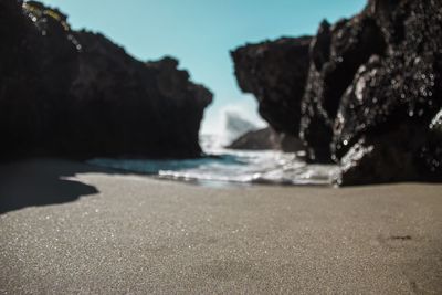 Surface level view of sea against clear sky