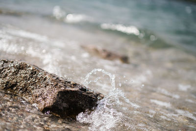 Close-up of water splashing on rocks