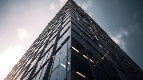 Low angle view of modern buildings against sky