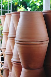 Close-up of terracotta pots for sale at market
