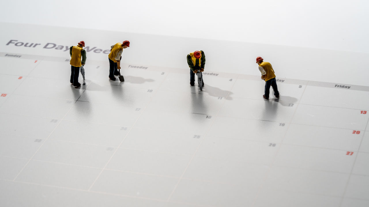 GROUP OF PEOPLE STANDING ON FLOOR