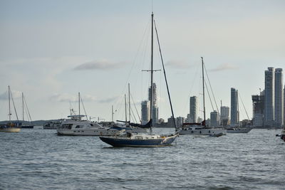 Boats sailing in sea