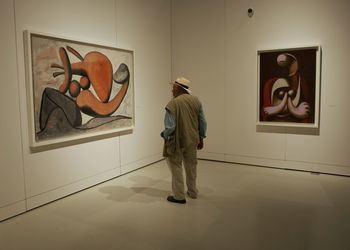 Rear view of senior man walking