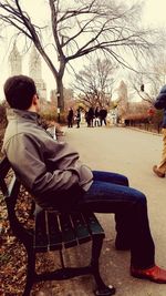 People sitting on bench in park