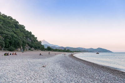 Scenic view of beach against clear sky