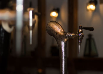 Close-up of illuminated faucet