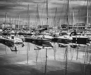 Boats moored at harbor