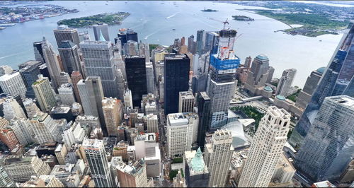 The statue of liberty with high-rise building in lower manhattan, new york city