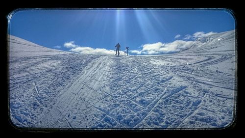 Scenic view of snow covered mountain against clear sky