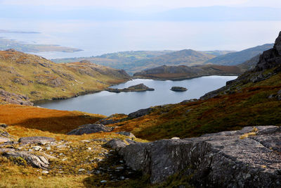 View of lake with mountain range in the background