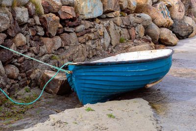 Boat moored on shore