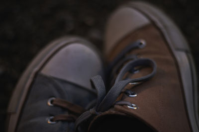 High angle view of shoes on metal